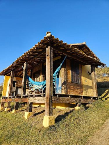 Carrancas Ski Chalet | Chalés Vila Real - Tranquilidade na Serra de Carrancas - Piscina com uma vista espetacular do Pôr do Sol