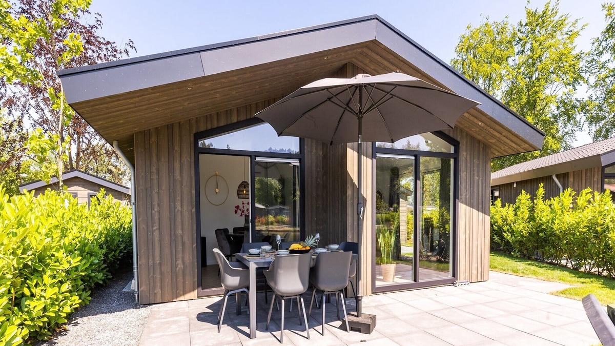 Municipality of Veldhoven Ski Chalet | Chalet by Pond with Sauna