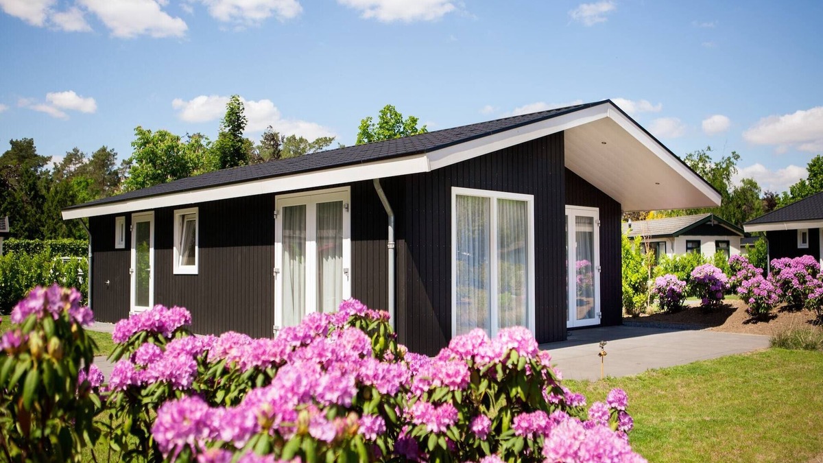 Municipality of Veldhoven Ski Chalet | Chalet in Netherlands by Scenic Pond