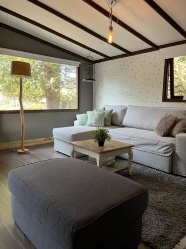 Hoevelaken House | Chalet op park met prive water in Hoevelaken