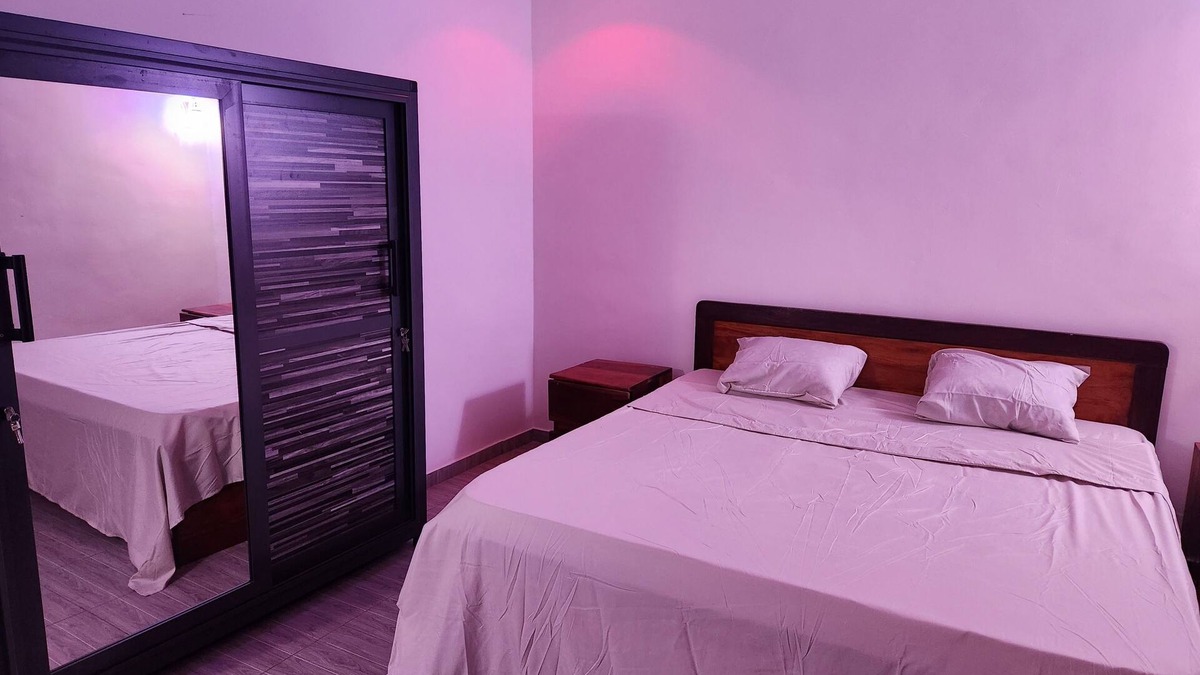 Lome House | Chambre Salon a Sanguera