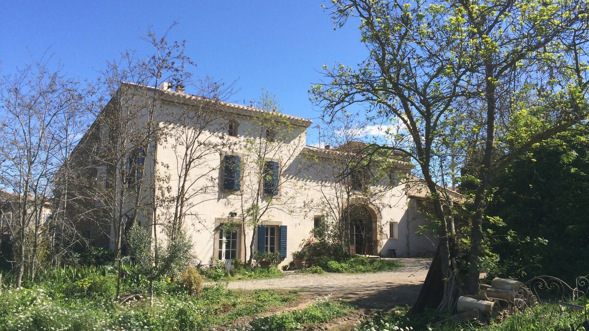 Ornaisons Cottage | Character building on large wooded grounds with private garden.