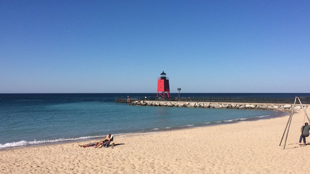 Charlevoix Villa | Charlevoix Mushroom Thatch House. Walk to Downtown. Beach Across the Street!