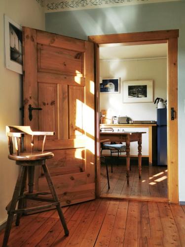 Weida Apartment | charmantes Apartment Siebenschläfer - Ferienwohnung Café 7