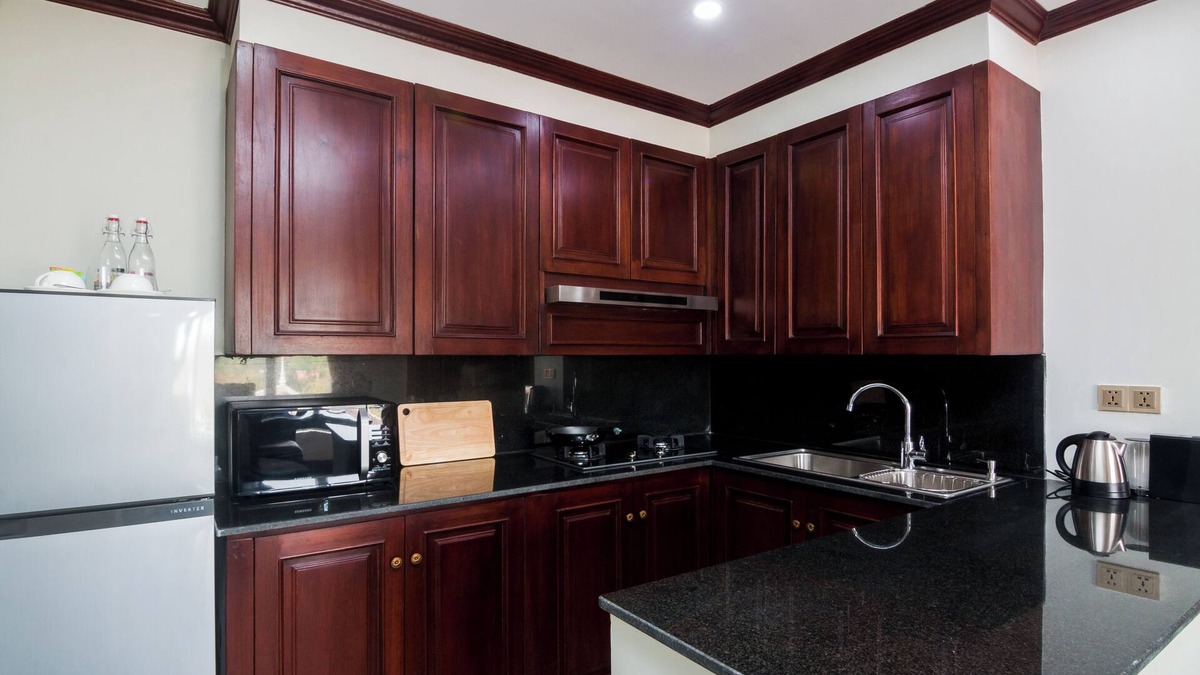Sangkat Sla Kram Apartment | Charming 2-bedroom with Kitchen, Pool, Fitness room