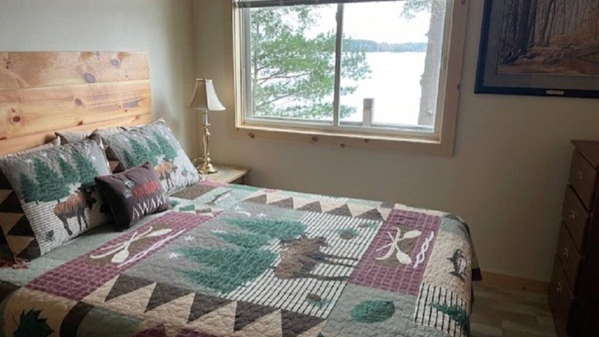 Arbor Vitae Cabin | Charming 2-bedroom cabin 30 feet from the shores of Mid Lake on Minocqua Chain