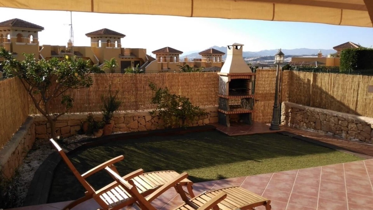 Los Puertos Apartment | Charming and spacious ground floor apartment with own gardens and shared pool
