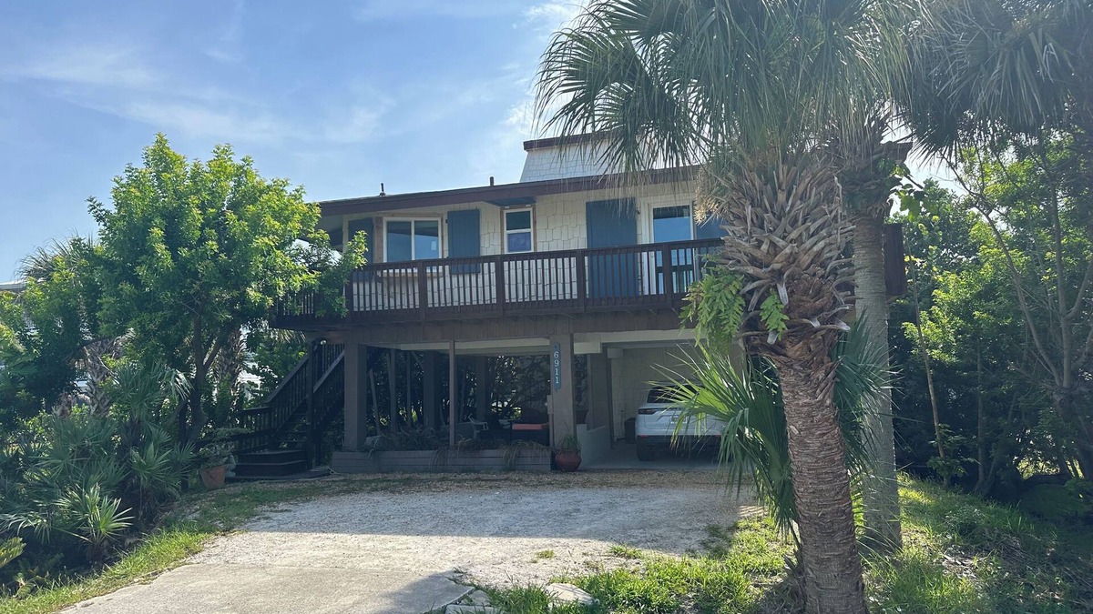 Bethune Beach House | Charming beachside bungalow steps from the beach.