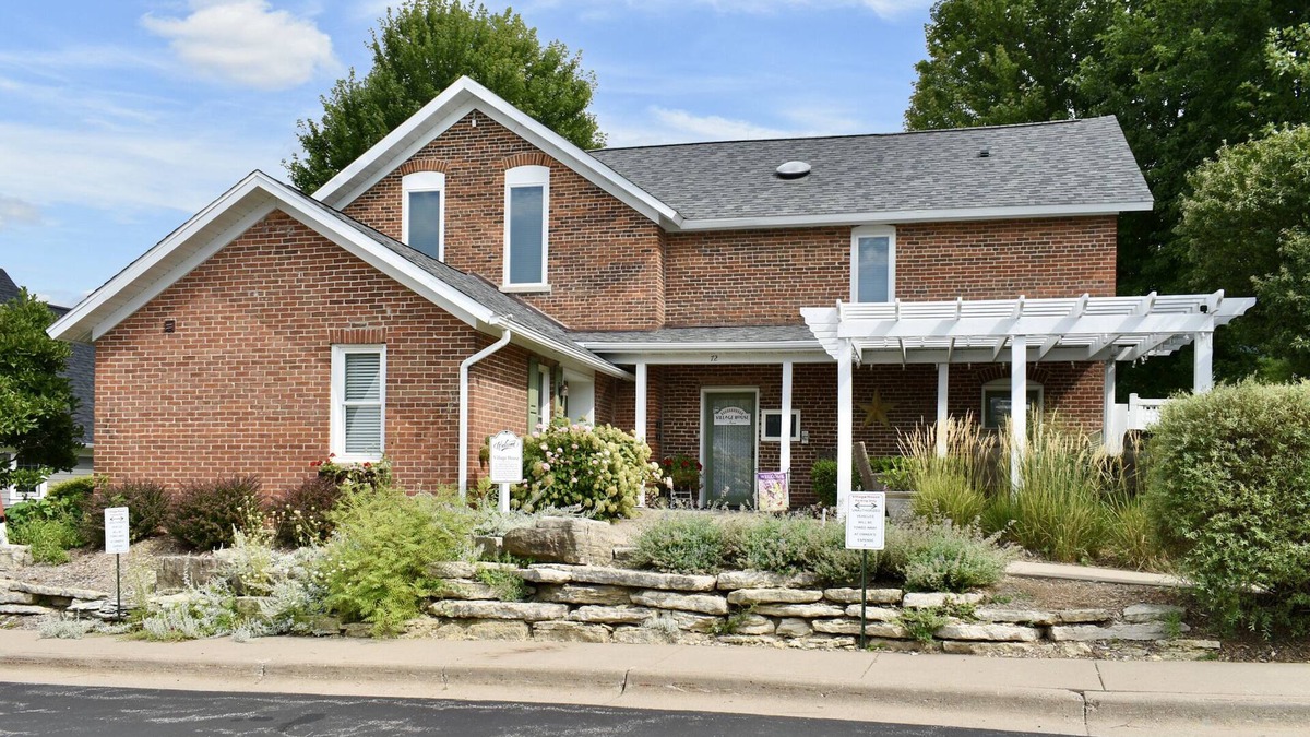 Winona House | Charming Brick Farmhouse with a Touch of Elegance. -Winona