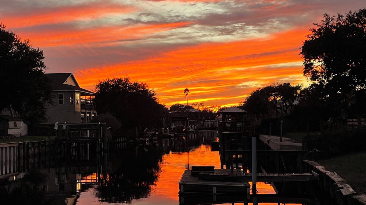 Butler Beach House | Charming Canal Front Cottage! Walk to the Beach!