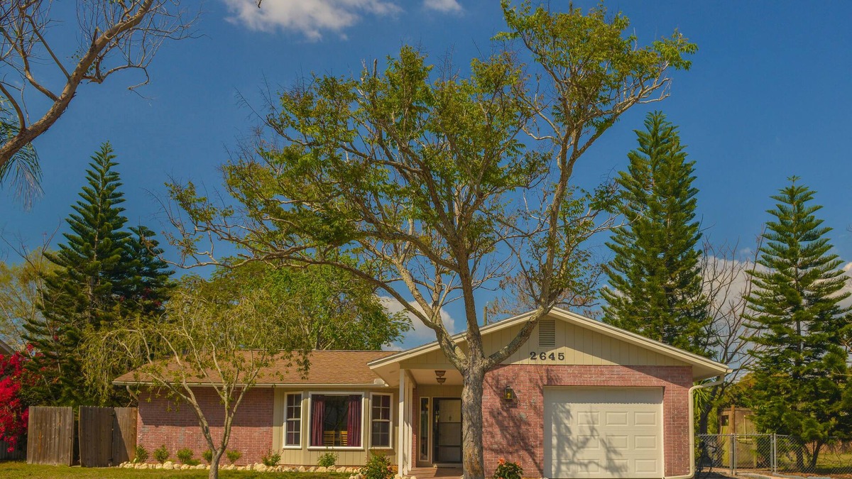 Ringling Park House | Charming Florida bungalow with pool and fenced-in yard.