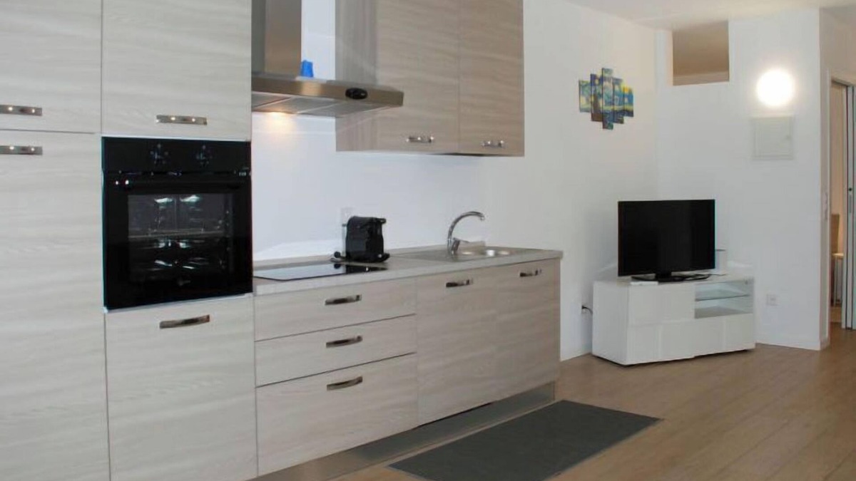 Bissone Apartment | Charming Gardenview App. 102 by Interhome