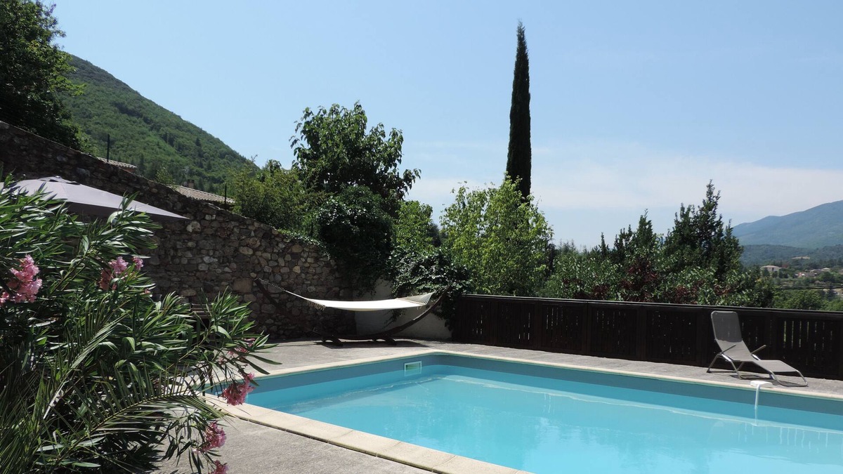 Olargues House | Charming holiday home with large swimming pool, nestled in a mature garden.