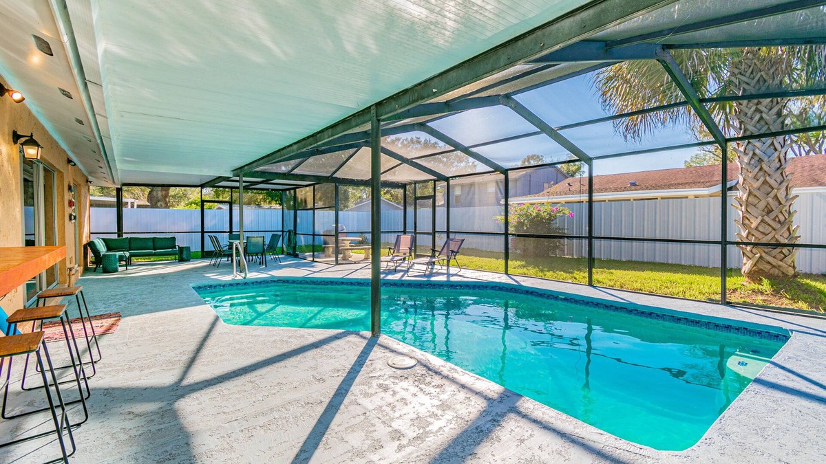 Tampa House | Charming home with amazing heated pool! Close to Airport, Beaches & Attractions.