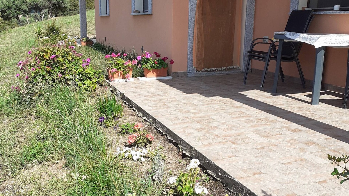Aglientu Apartment | Charming juniper house with pool -solarium, sea view and lots of nature