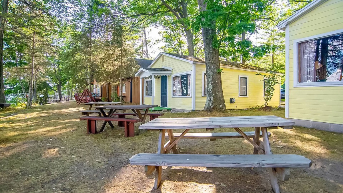 Indian River Cottage | Charming lakefront cottage with large yard, dock, & fire pit - close to downtown