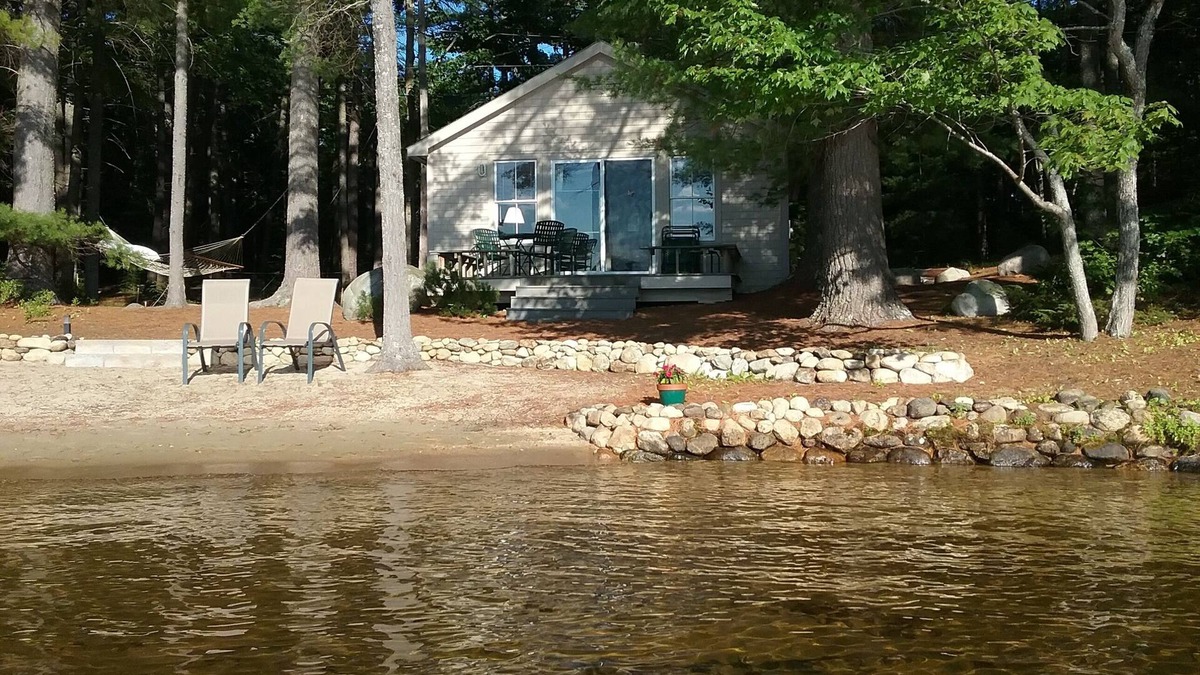 Milton Cottage | Charming lakefront cottage with sandy beach on a large private wooded lot