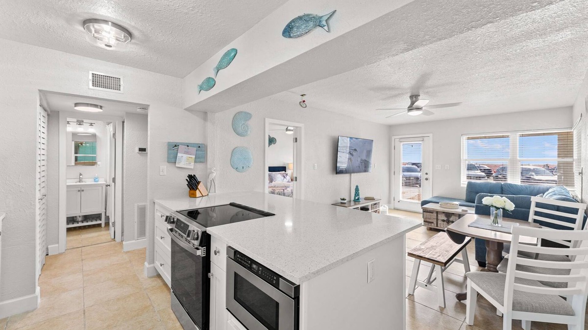 Pass-a-Grille Historic District Condo | Charming Pass-a-Grille beachfront condo, St. Pete Beach, heated pool, laundry
