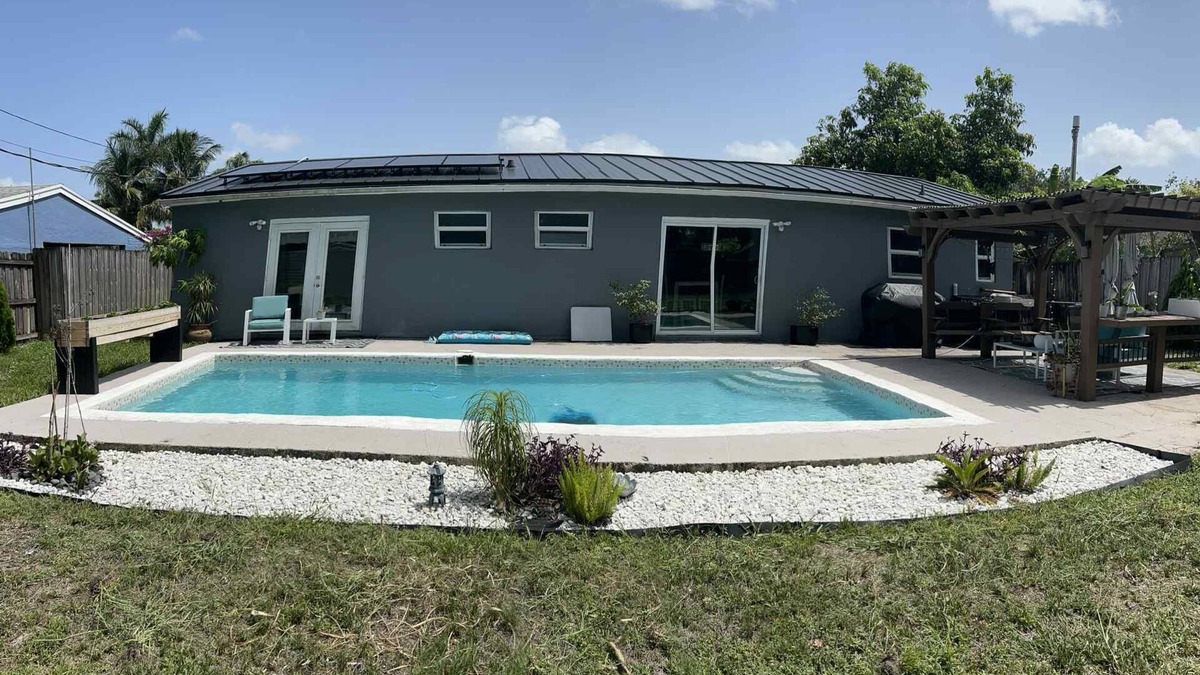 Driftwood House | Charming pool home by Hard Rock