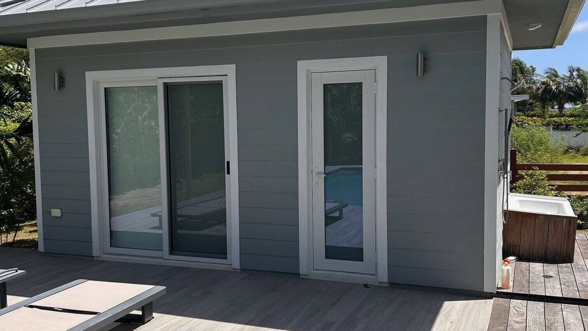 Seven Mile Beach House | Charming pool house with AC and WiFi in West Bay.