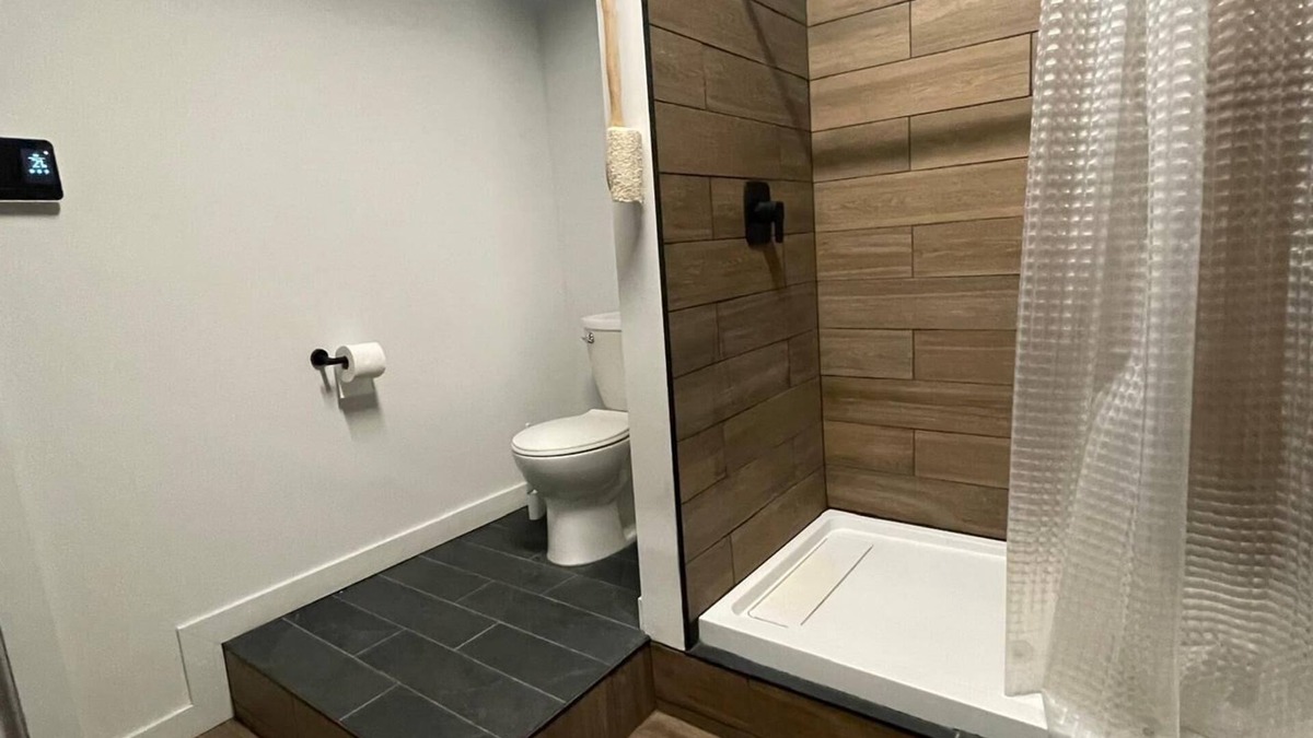 Algoma District Apartment | Charming Prohibition-Era Speakeasy Lounge with Bedroom and Commercial Kitchen