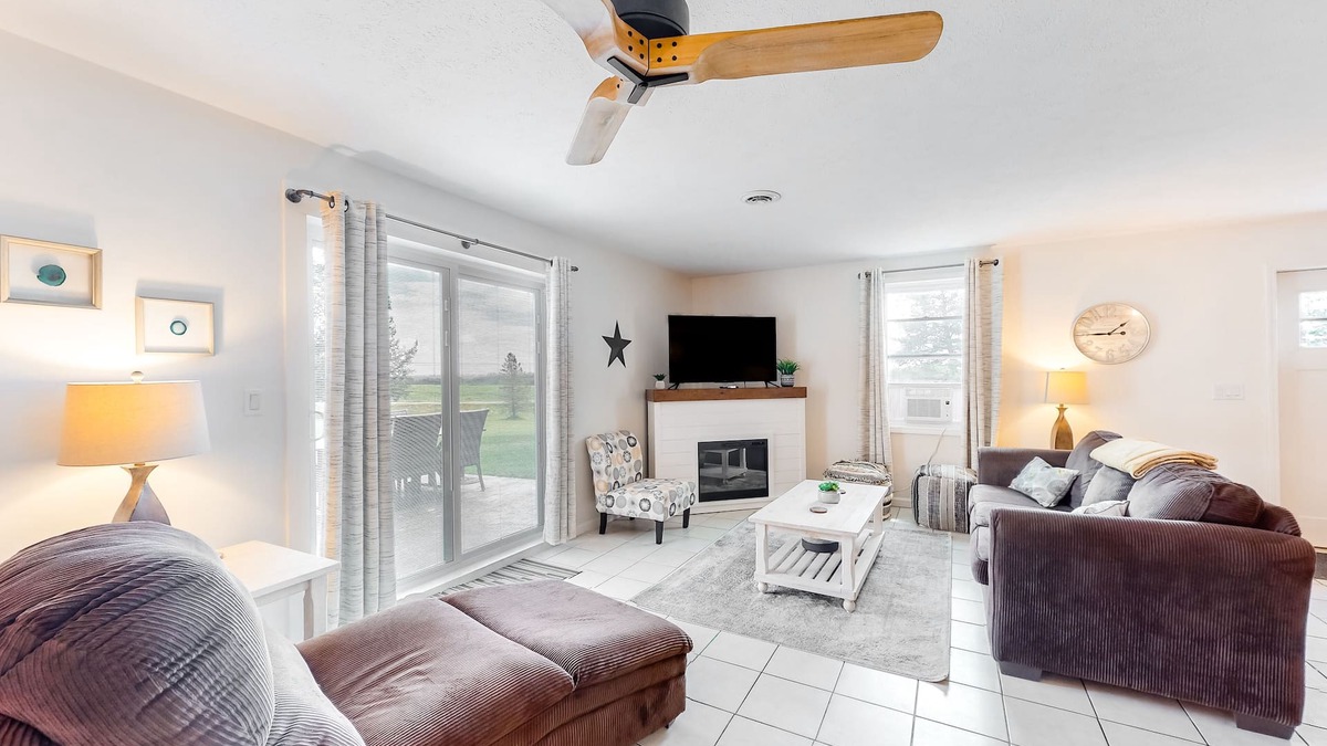 Branchport House | Charming retreat with private hot tub, fireplace, & furnished patio