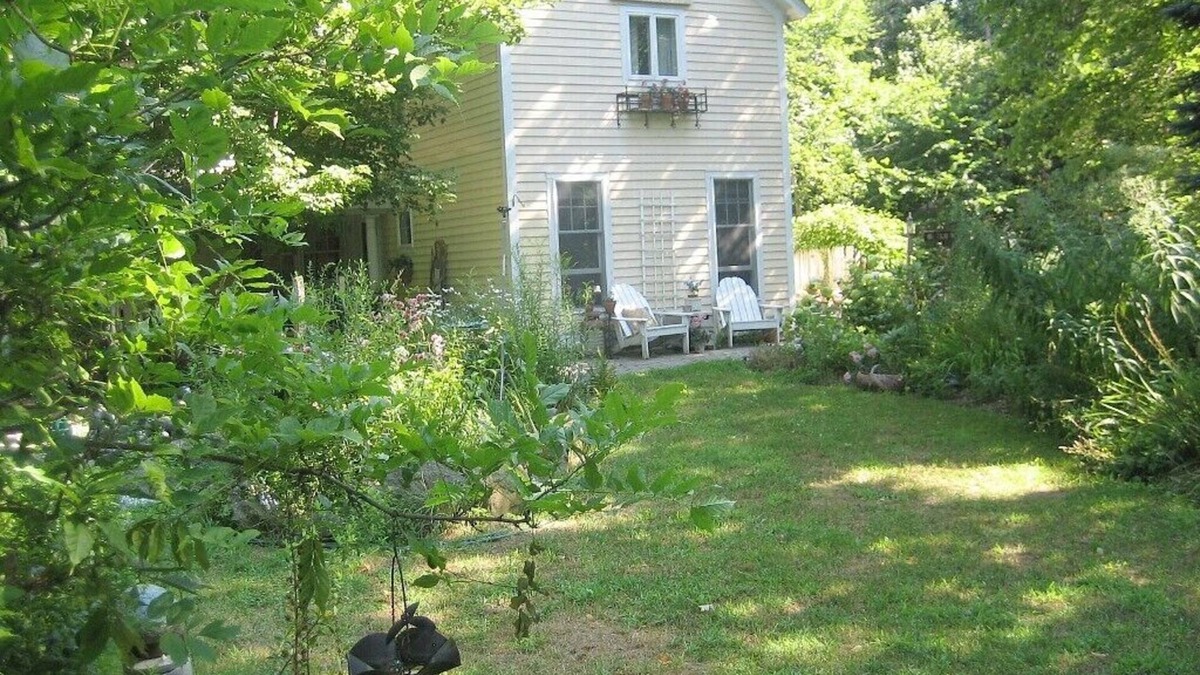 Bantam House | Charming, river front compound