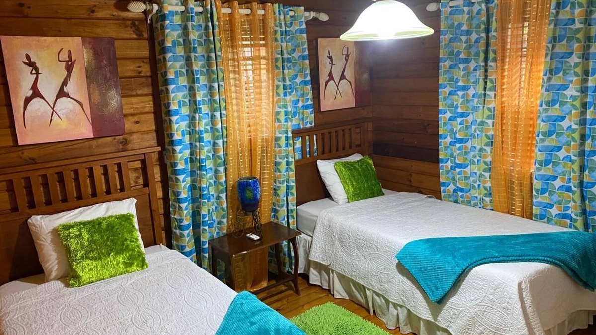 Signal Hill Cabin | Charming SEAVIEW lodge TUCKED IN THE MOUNTAINSIDE of Signal Hill TOBAGO