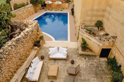 Xewkija Villa | Charming & Stylish Historic Farmhouse with Pool