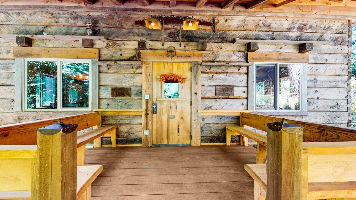 Clinton House | Charming woodland cottage with 2 covered porches, wood stove, treehouse, firepit