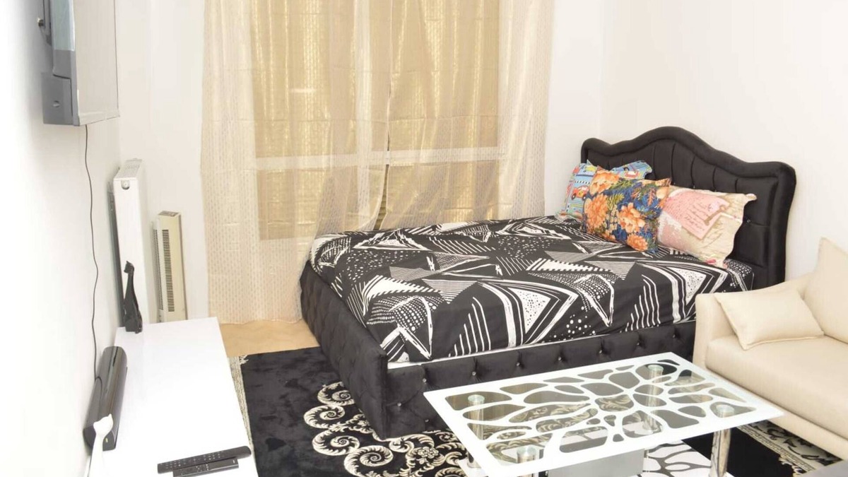 Bobigny Apartment | Cheap Charming family size studio with self made office, TV, WiFi, Cafe, etc