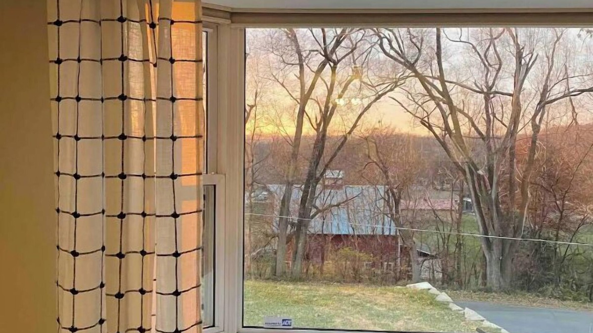 Council Bluffs House | Cheerful two bedroom home in quiet neighborhood. Sun Porch ~ Patio ~ Large yard