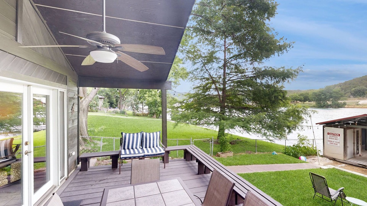 Saratoga Point House | Chic home on Lake Austin with dock, lovely deck, vibrant interior & views