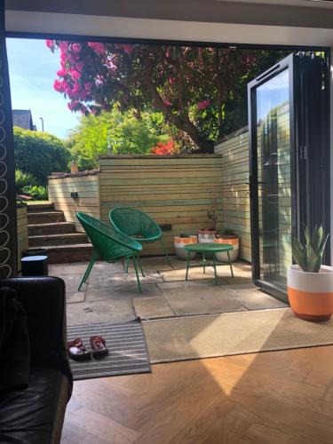 Chorlton-cum-Hardy Apartment | Chorlton Garden Rooms. Relax, work, stay and play.