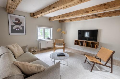 Copenhagen City Centre Apartment | City Apartment With Exposed Ceiling Beams