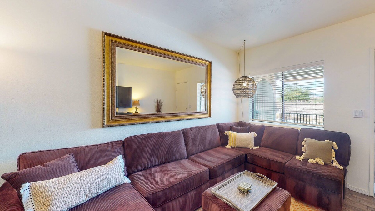 Dietz Condo | Classic condo with a balcony, washer/dryer, central AC, pool