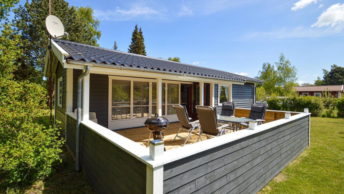 Næsby Strand House | Classic, Danish cottage near the water.