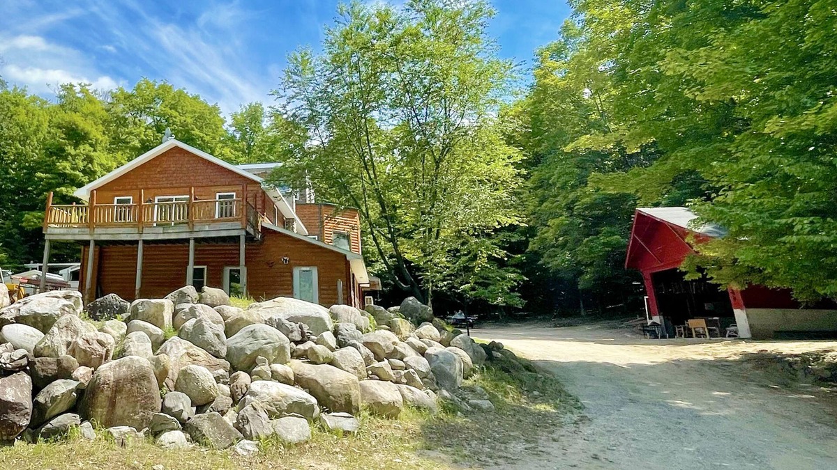 Central Lake House | Close to Torch Lake. Event and Sports Barn. Great golf nearby. Sleeps 13+. Bunks