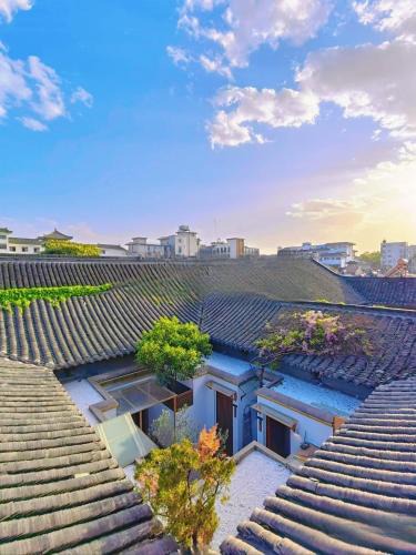 Guangling Qu House | cloud and wind