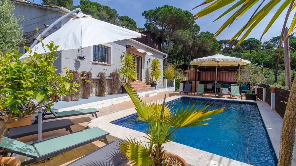 Vidreres Villa | Club Villamar - Experience serene luxury at a tranquil villa retreat with a private pool, modern .