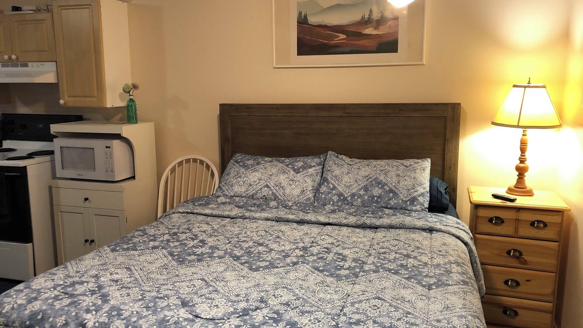 Chilliwack Proper Village West House | Coach house with outside seating area and Kitchen facilities. No-1