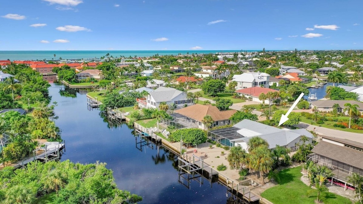Shell Harbor House | Coastal Charm: Pool Home on Canal on East End!