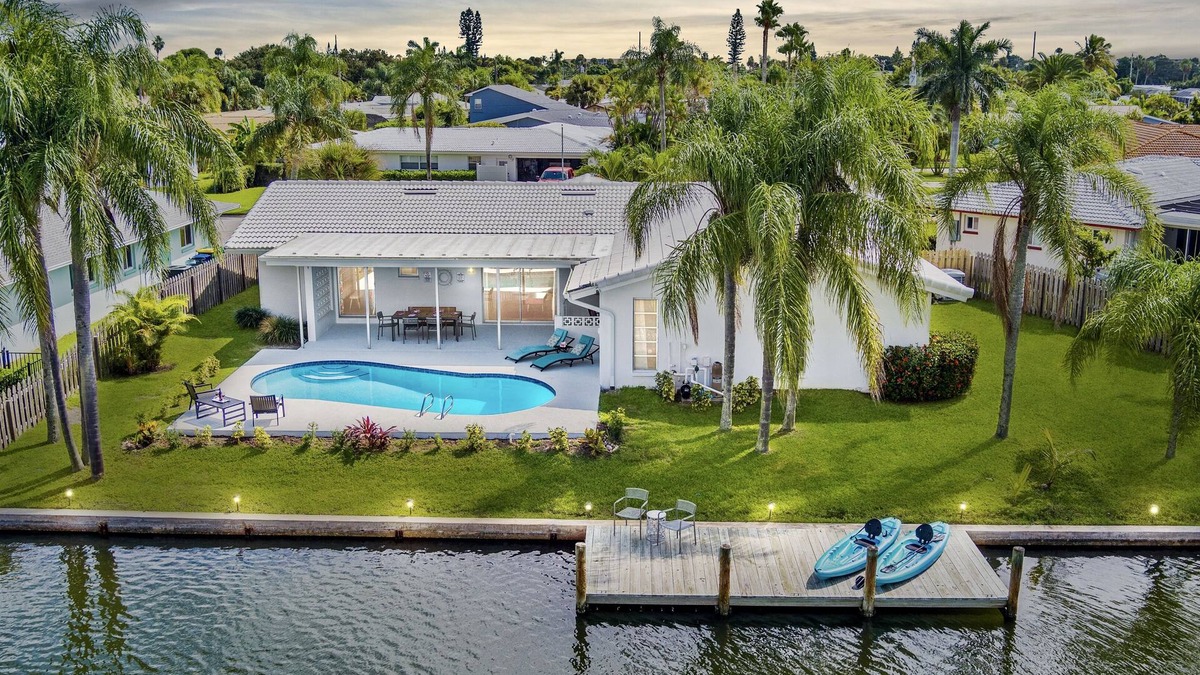 Venetian Way House | Cocoa Beach Coral Retreat waterfront 3 BR/2.5 BA