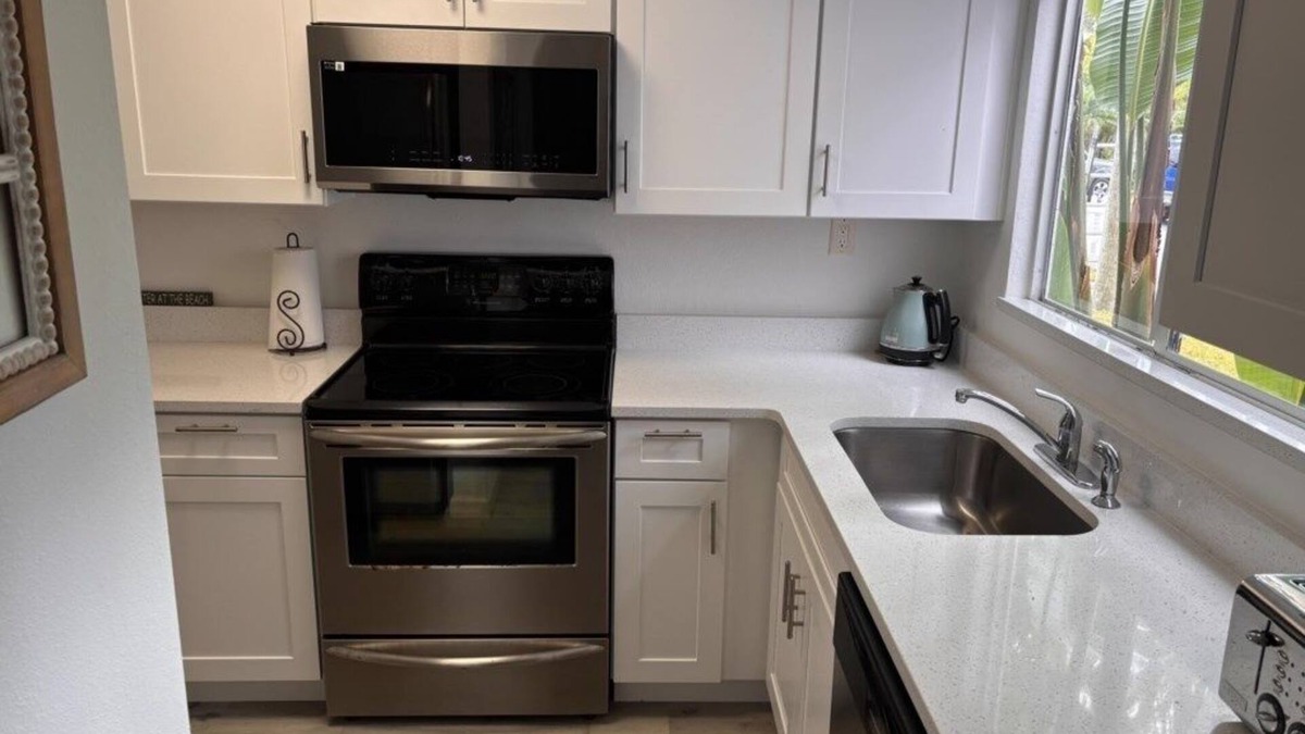 New Smyrna Beach Condo | Coconut Palms Townhome 2 Bedroom Townhouse by RedAwning