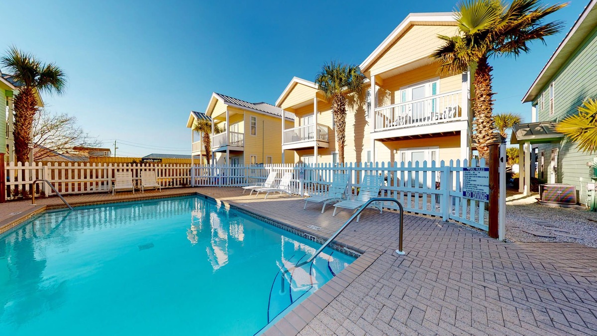 Sago Park Townhomes House | Colorful Beach House with Outdoor Pool, WiFi, Washer/Dryer, & Central A/C
