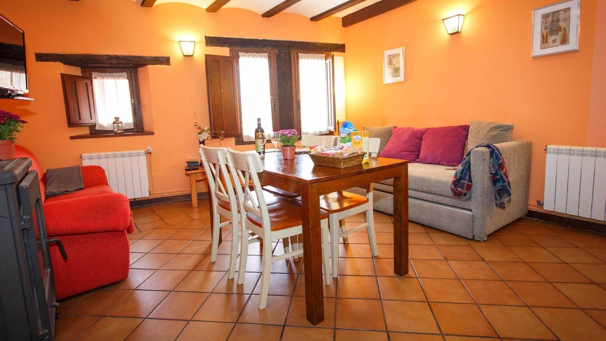 Robregordo Apartment | Comfortable bedroom apartment and sofa bed on the ground floor with fireplace
