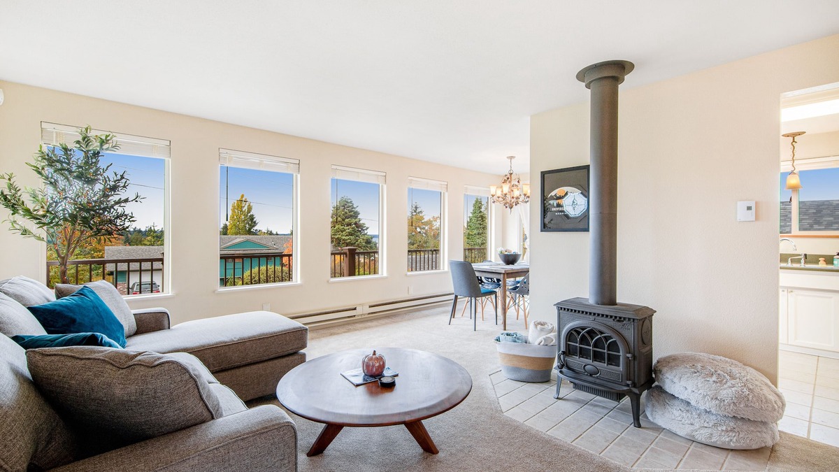 University Place House | Comfortable home with Puget Sound view, decks, garden patio, WiFi & W/D