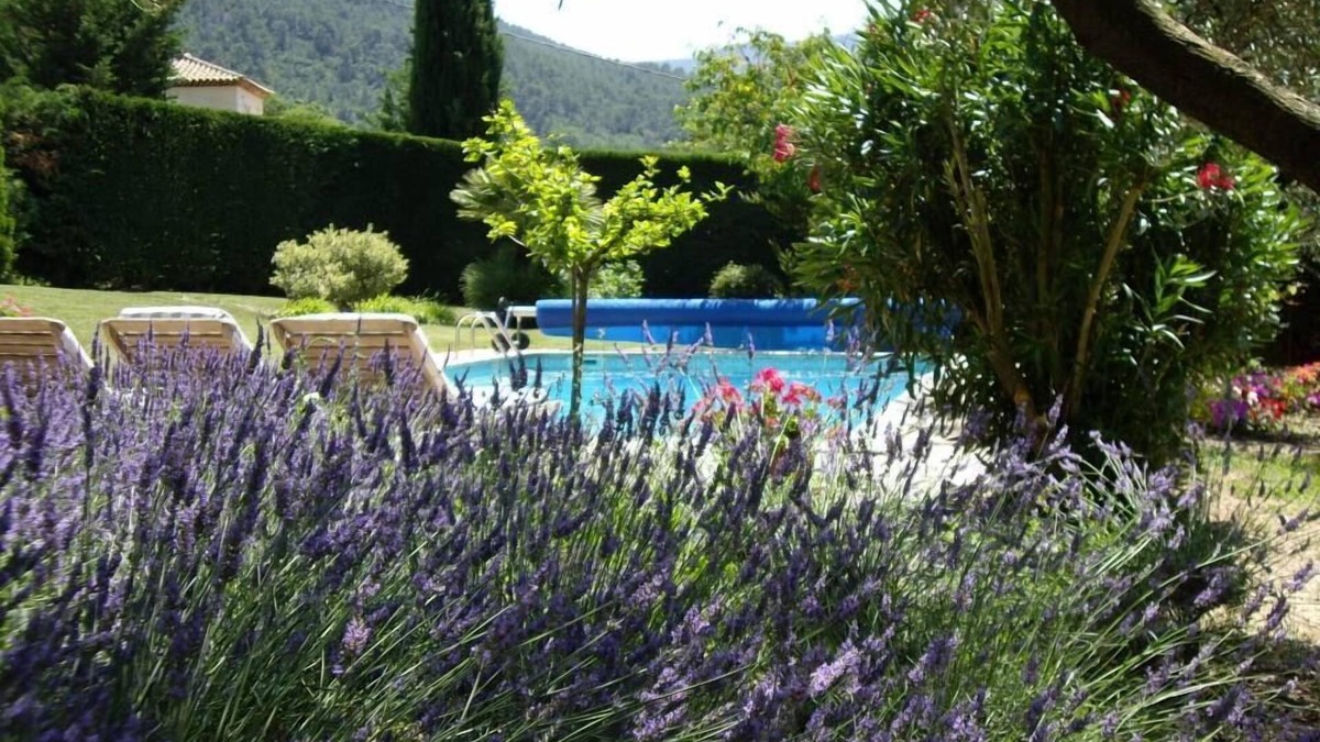 Auriol House | Comfortable house situated in the heart of a landscaped garden, pool wheelchair