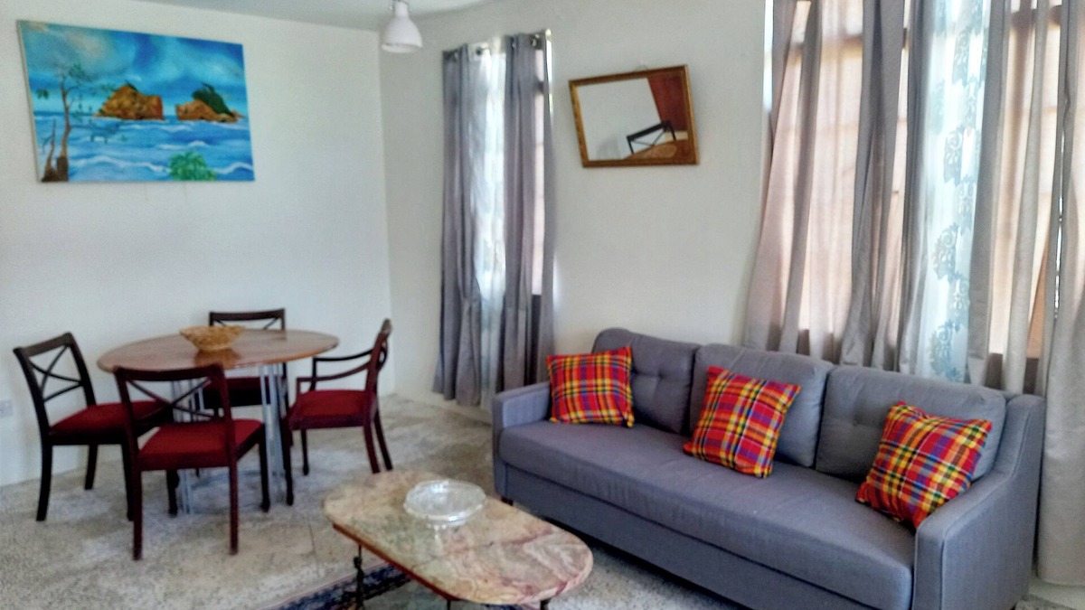 Calibishie House | Comfortable, local home with A/C and private verandah
