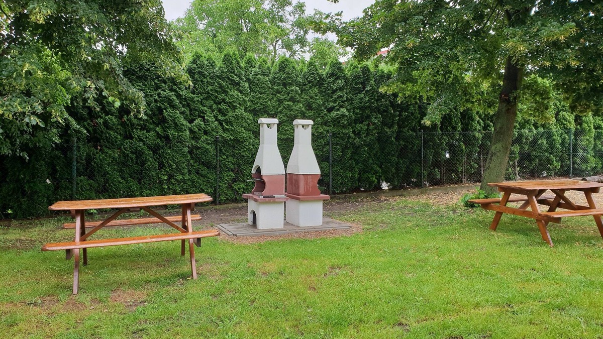 Powidz Apartment | Comfortable rooms near the lake.